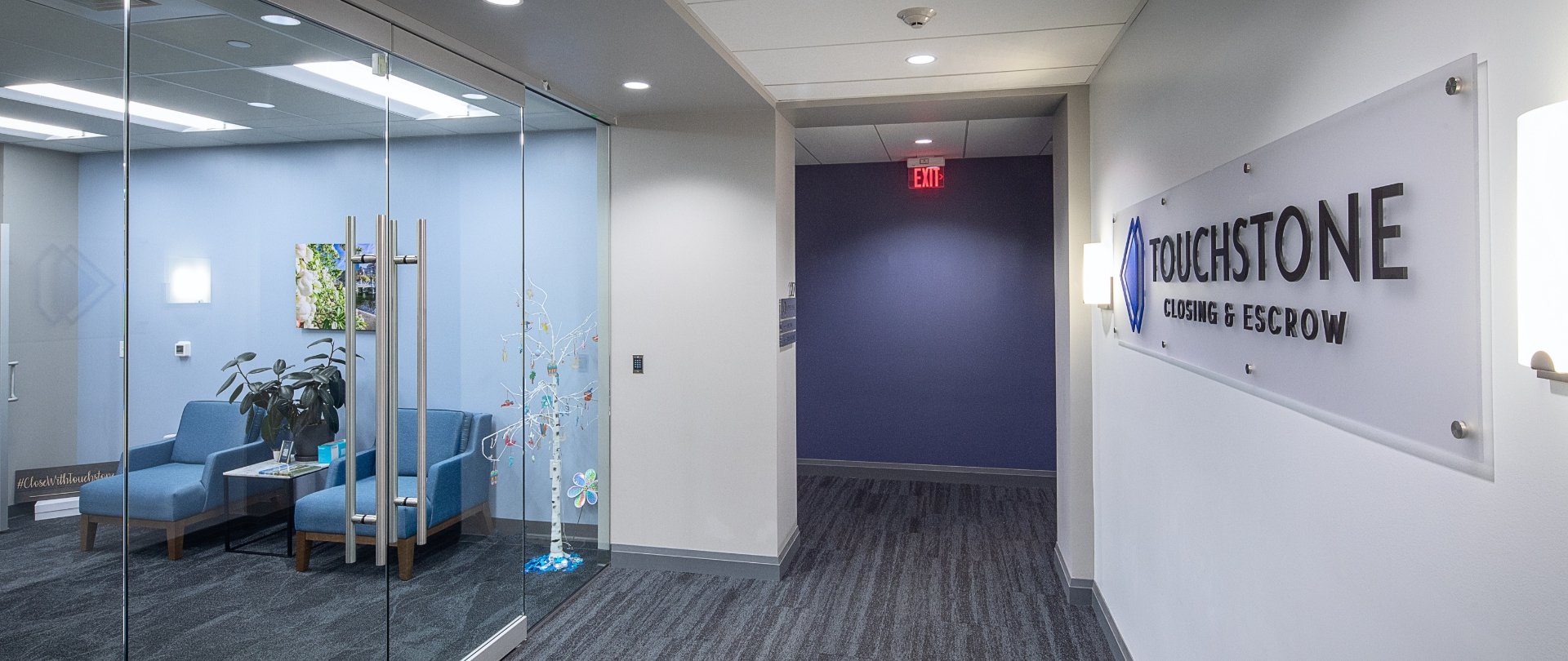 Touchstone office interior waiting room and sign